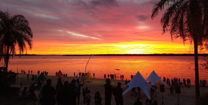 Sunset over a river beach at Ituzaingó, gateway town to the northern Iberá portals
