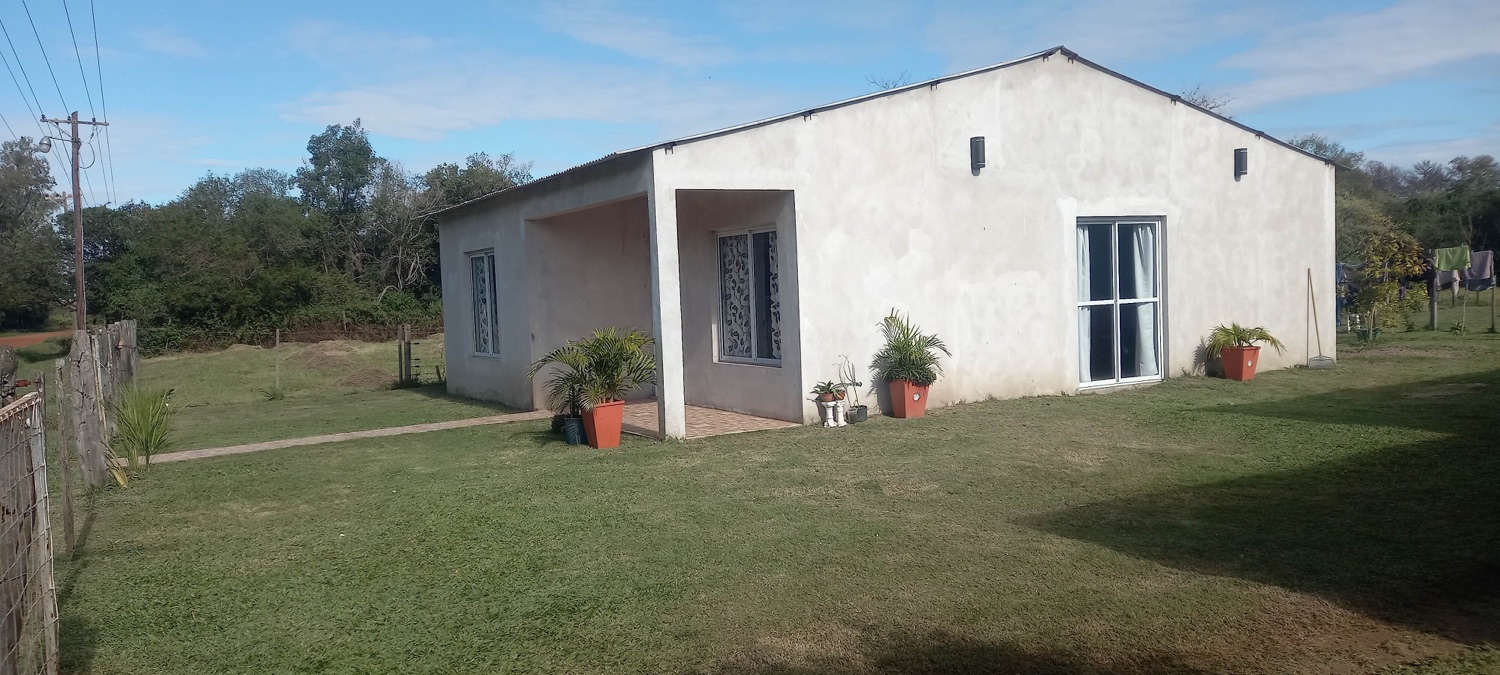 Living con sillones y TV