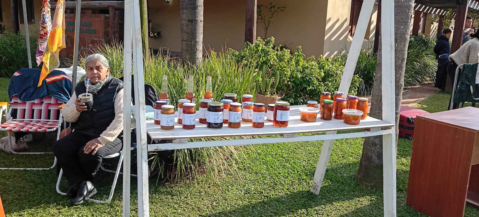 The stall table with the range of jams and preserves, outdoors