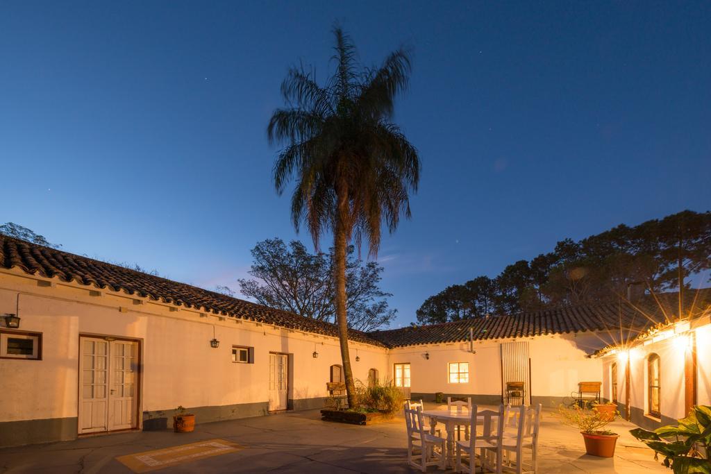 The main house courtyard lit up at night