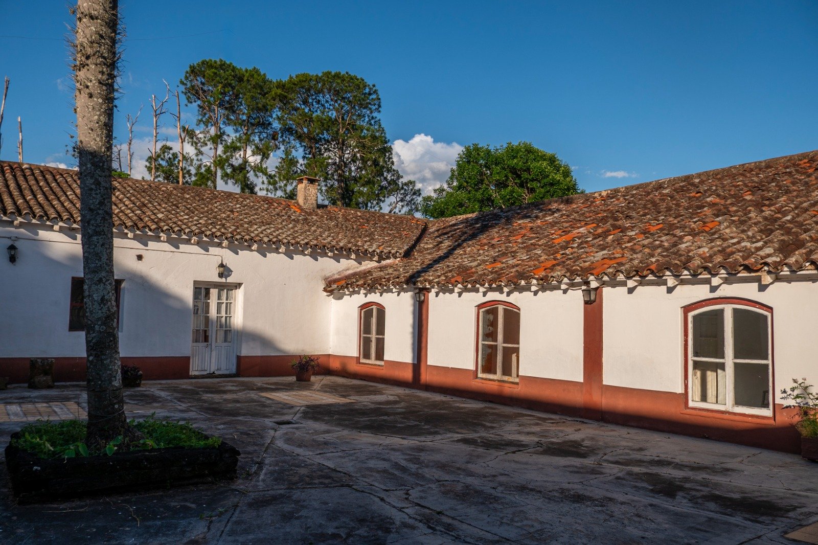 Inner courtyard with galleries and colonial roof tiles