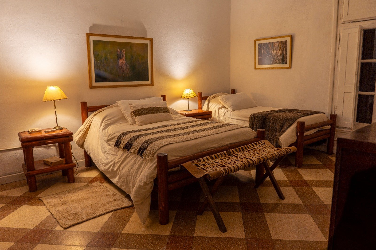 Room with a double and a single bed