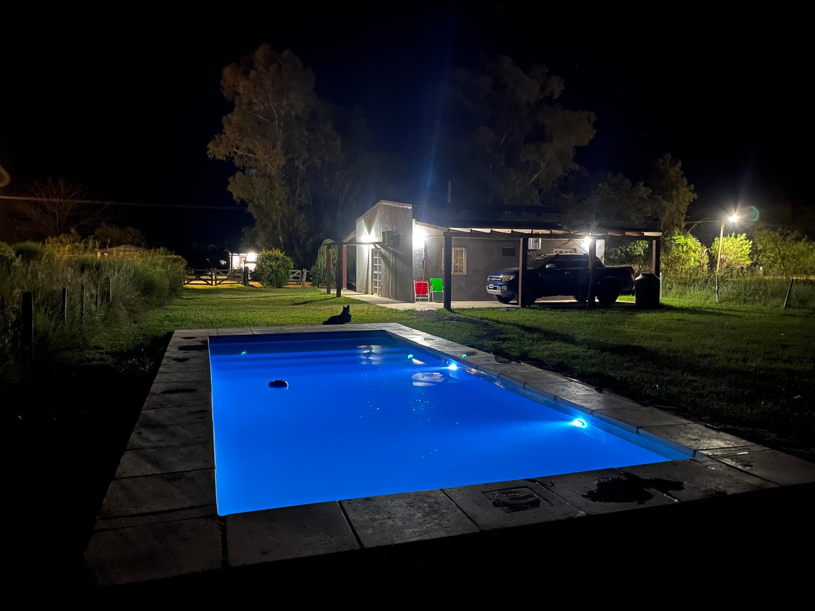 The pool lit up at night