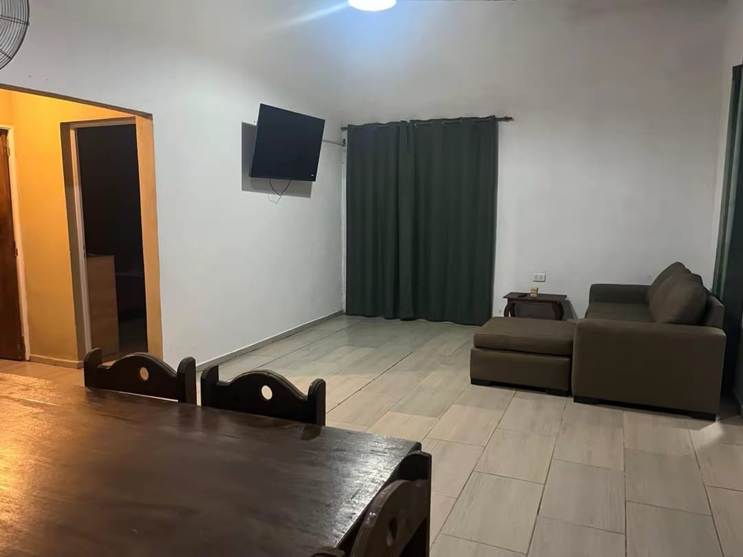 The living room, with the sofa and the table