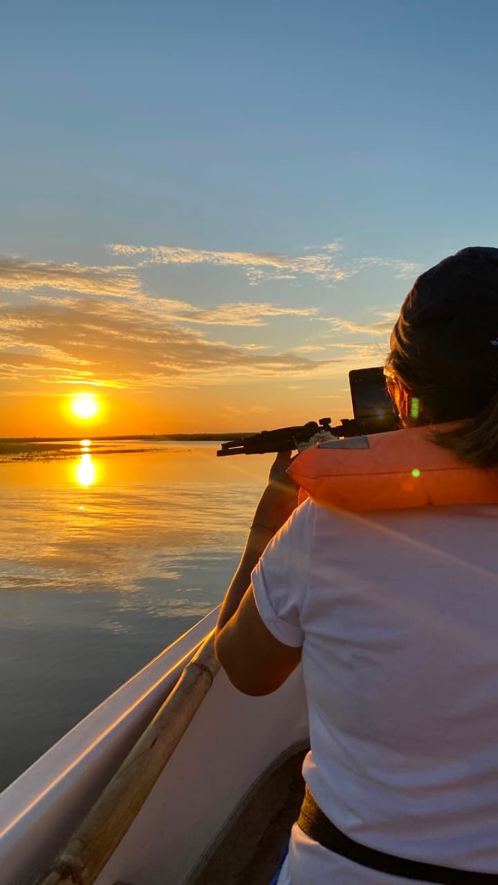 Fotografiando el atardecer desde la lancha