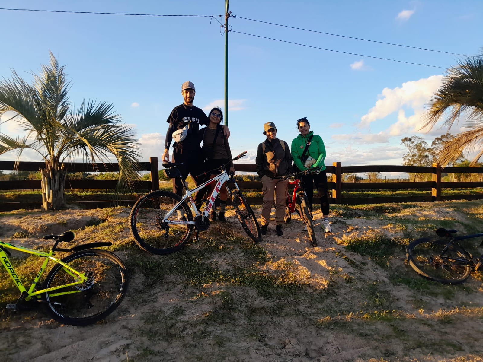 Cycling outing, with the bikes leaning on the gate