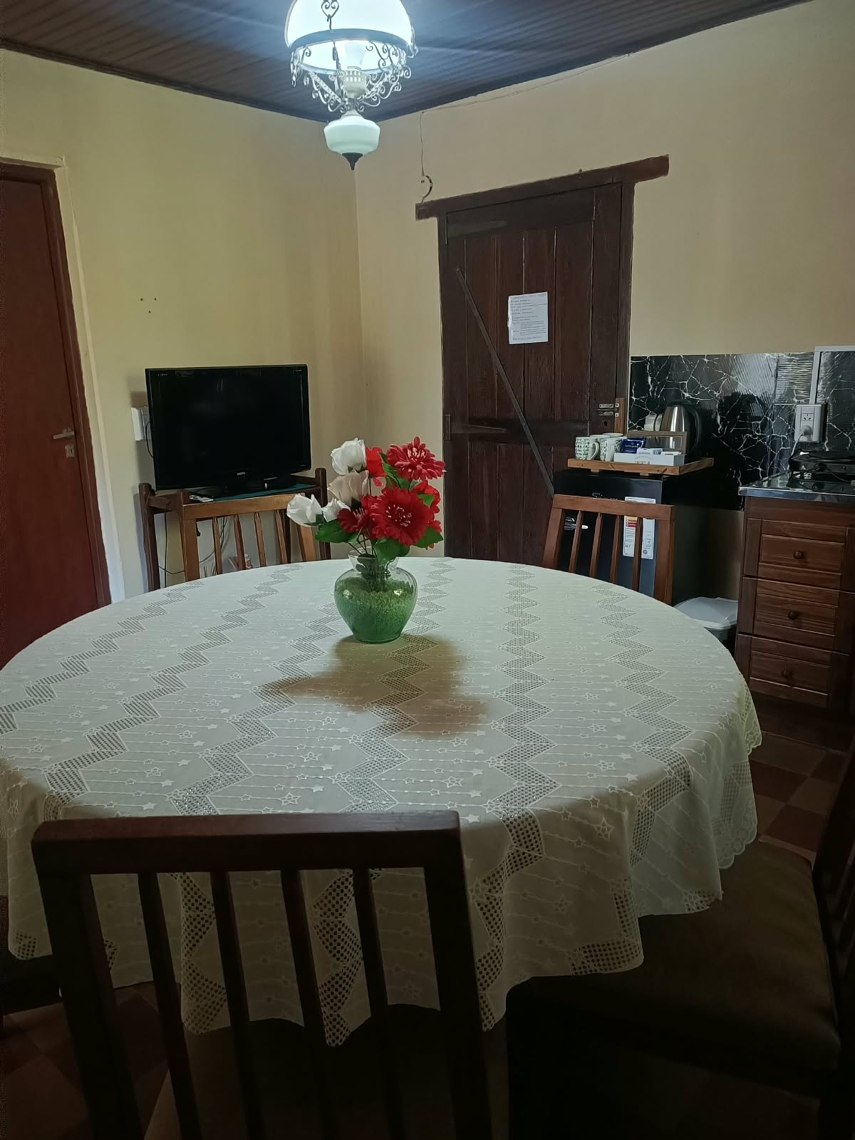 The dining table and the TV