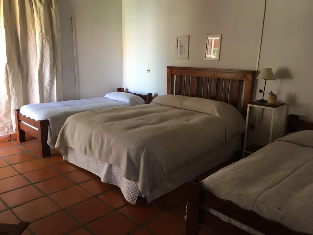 A room with three beds