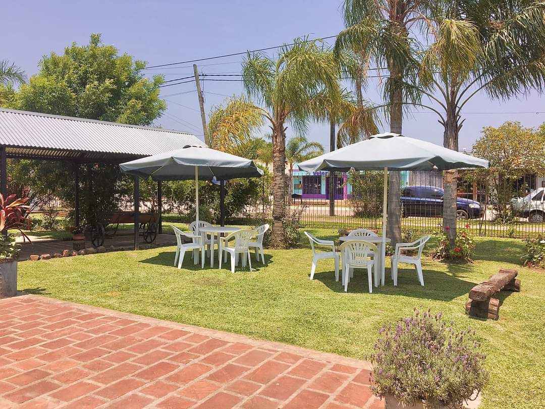 Tables with umbrellas in the garden