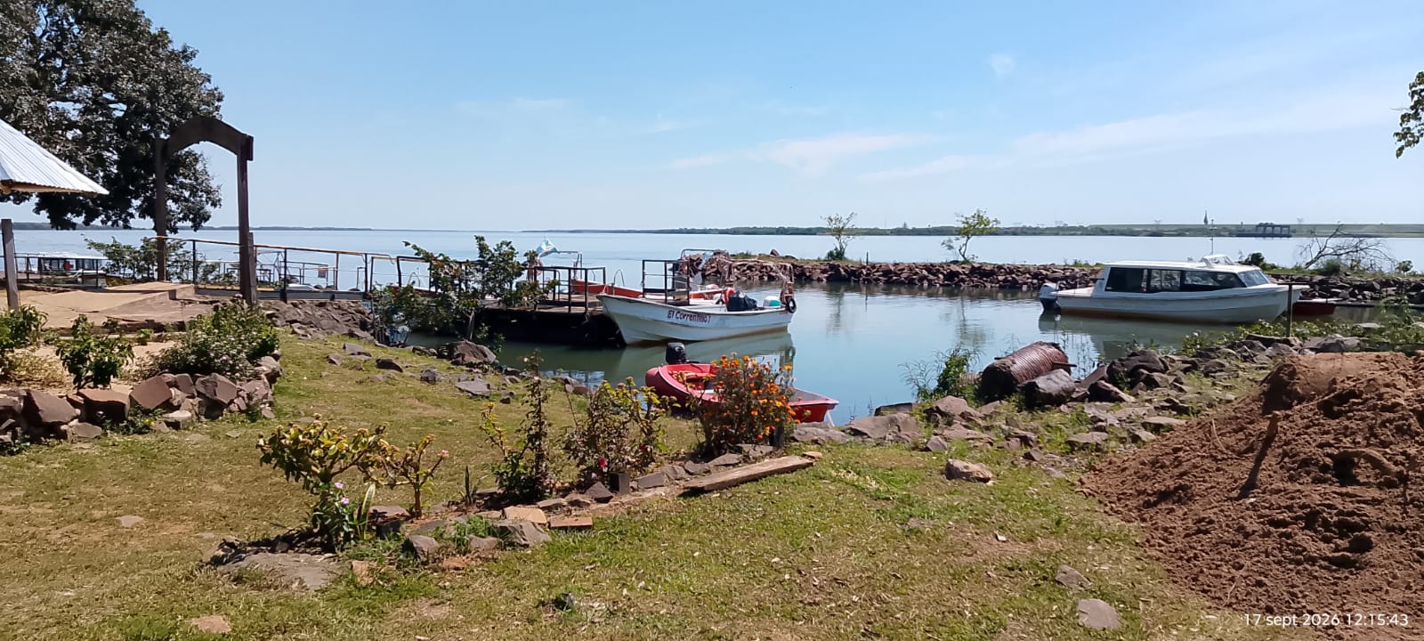 The island sign by the gazebo, facing the water